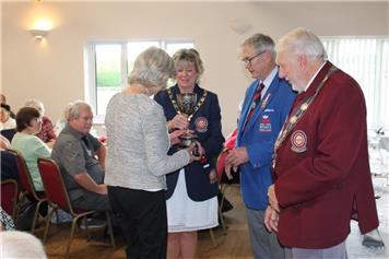 TROPHY FOR JANIE AND SURPRISE FOR KAY